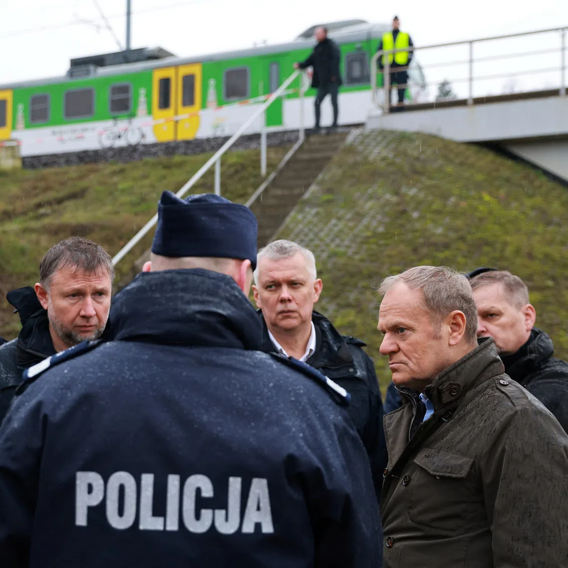 Polish Prime Minister Donald Tusk visits the site of a blast on railway of the Warsaw-Lublin line in Mika, Poland, November 17, 2025. KPRM/Handout via REUTERS ATTENTION EDITORS - THIS IMAGE HAS BEEN SUPPLIED BY A THIRD PARTY. NO RESALES. NO ARCHIVES