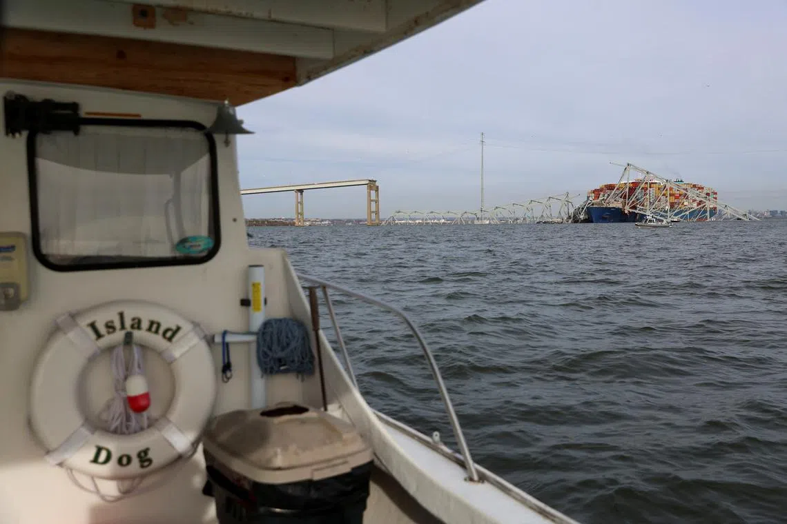 A view of the Dali cargo vessel which crashed into the Francis Scott Key Bridge causing it to collapse in Baltimore, Maryland, U.S., March 26, 2024.  REUTERS/Julia Nikhinson