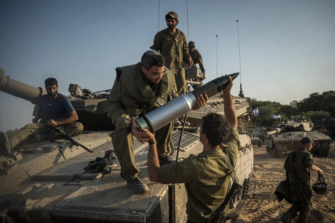 Israeli soldiers have staged “localised” raids inside Gaza to back an air onslaught on the territory.