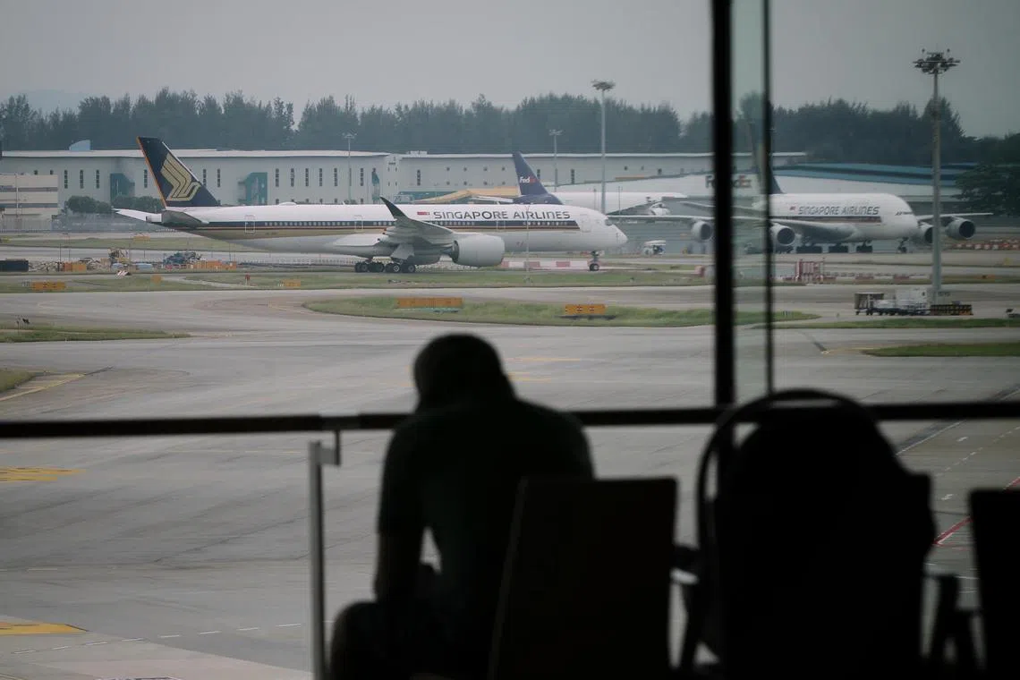 Singapore Airlines (SIA) aircrafts at the tarmac at Changi Airport on October 14, 2020. Pictured from the viewing gallery at Terminal One.