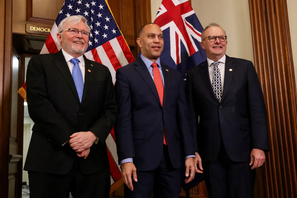 FILE PHOTO: Australian Ambassador to the U.S. Kevin Rudd, U.S. House Minority Leader Hakeem Jeffries (D-NY) and Australian Prime Minister Anthony Albanese pose for a photo in the U.S. Capitol in Washington, D.C., U.S., October 21, 2025. REUTERS/Kylie Cooper/File Photo