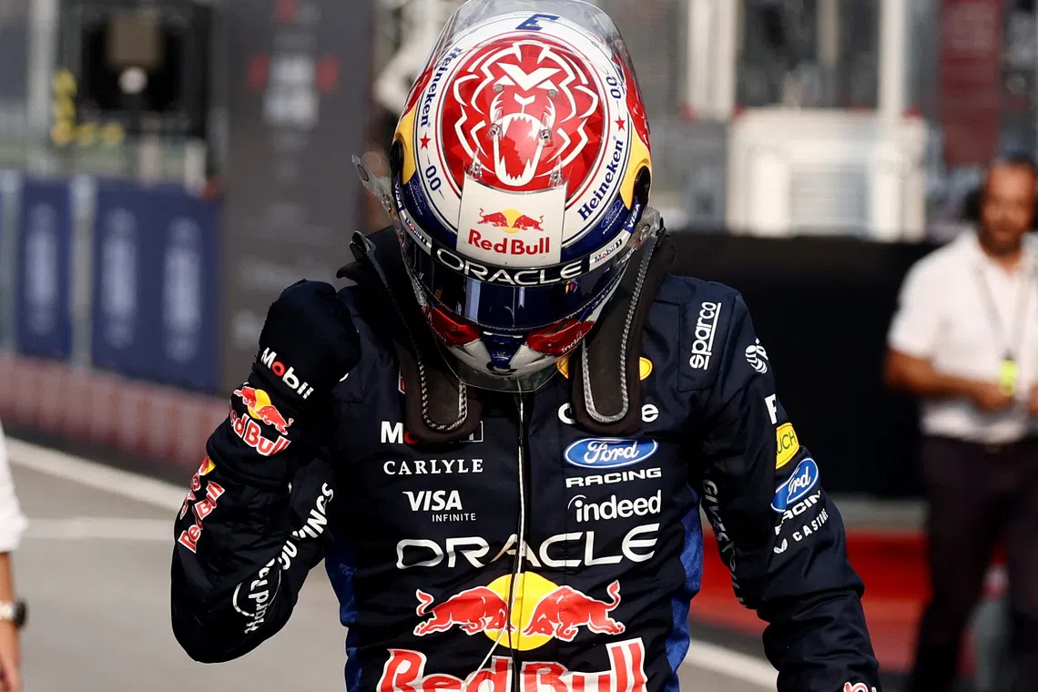 Red Bull’s Max Verstappen celebrating after qualifying in pole position on Oct 3.
