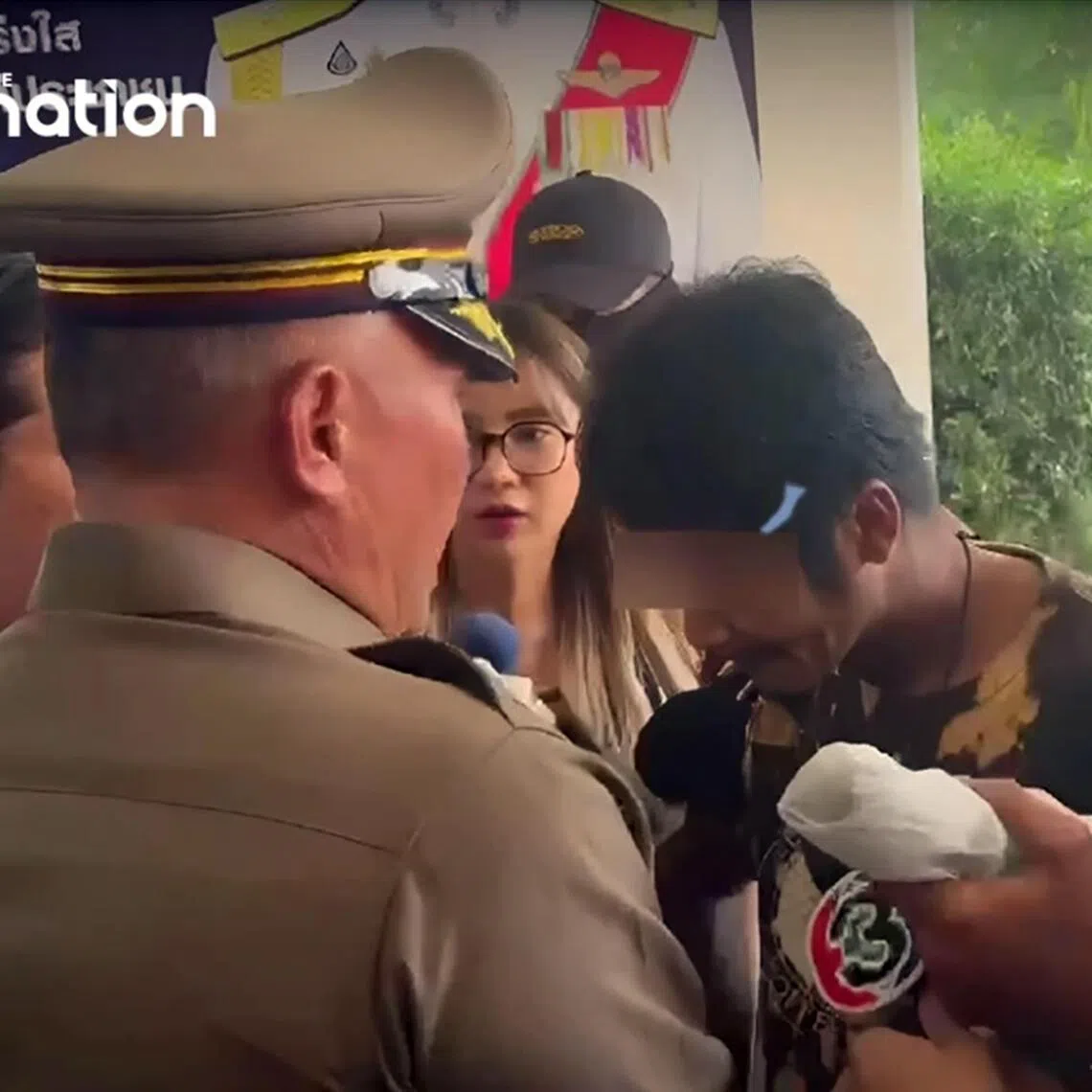 An alleged gunman who shot at a motorway rescuer in Pathum Thani, causing panic and the closure of 17 schools, has surrendered to police after realizing the disruption caused by his actions.