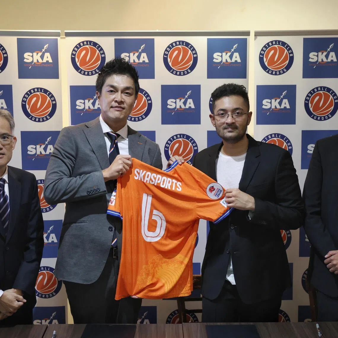 (From left) FC Jurong vice chairman Koh Mui Tee,  chairman Daisuke Korenaga, SKASports Investments directors Rohit Ramesh and Sudhir Menon at the signing of the strategic partnership at Jurong East Stadium on May 16.