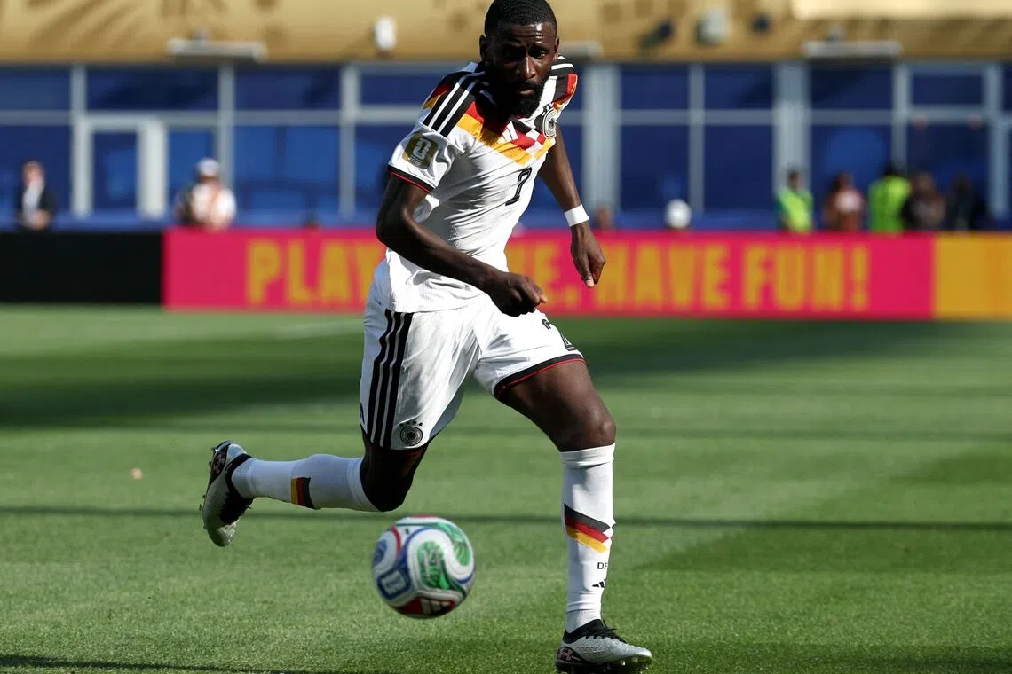 (FILES) Germany's defender #02 Antonio Ruediger controls the ball during the 2026 World Cup round of 32 football match between Germany and Paraguay at the Boston Stadium in Foxborough on June 29, 2026. Germany defender Antonio Rudiger on September 1, 2026 announced his international retirement, two months after last playing for Germany at the 2026 World Cup. The 33-year-old made 86 appearances for the four-time world champions. (Photo by FRANCK FIFE / AFP)