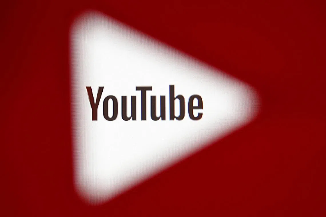 FILE PHOTO: A 3D-printed YouTube icon is seen in front of a displayed YouTube logo in this illustration taken October 25, 2017. REUTERS/Dado Ruvic/Ilustration/File Photo