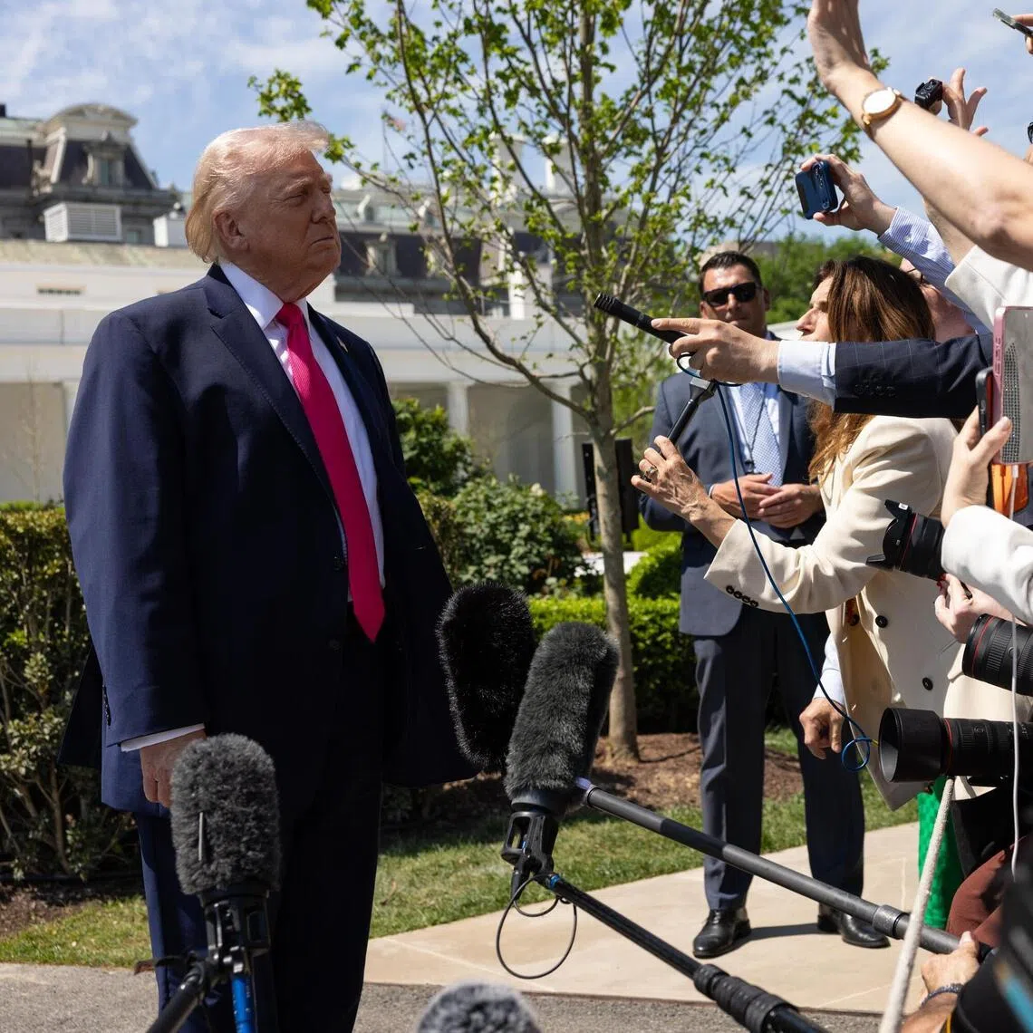 US President Donald Trump speaking to reporters outside the White House on April 16.