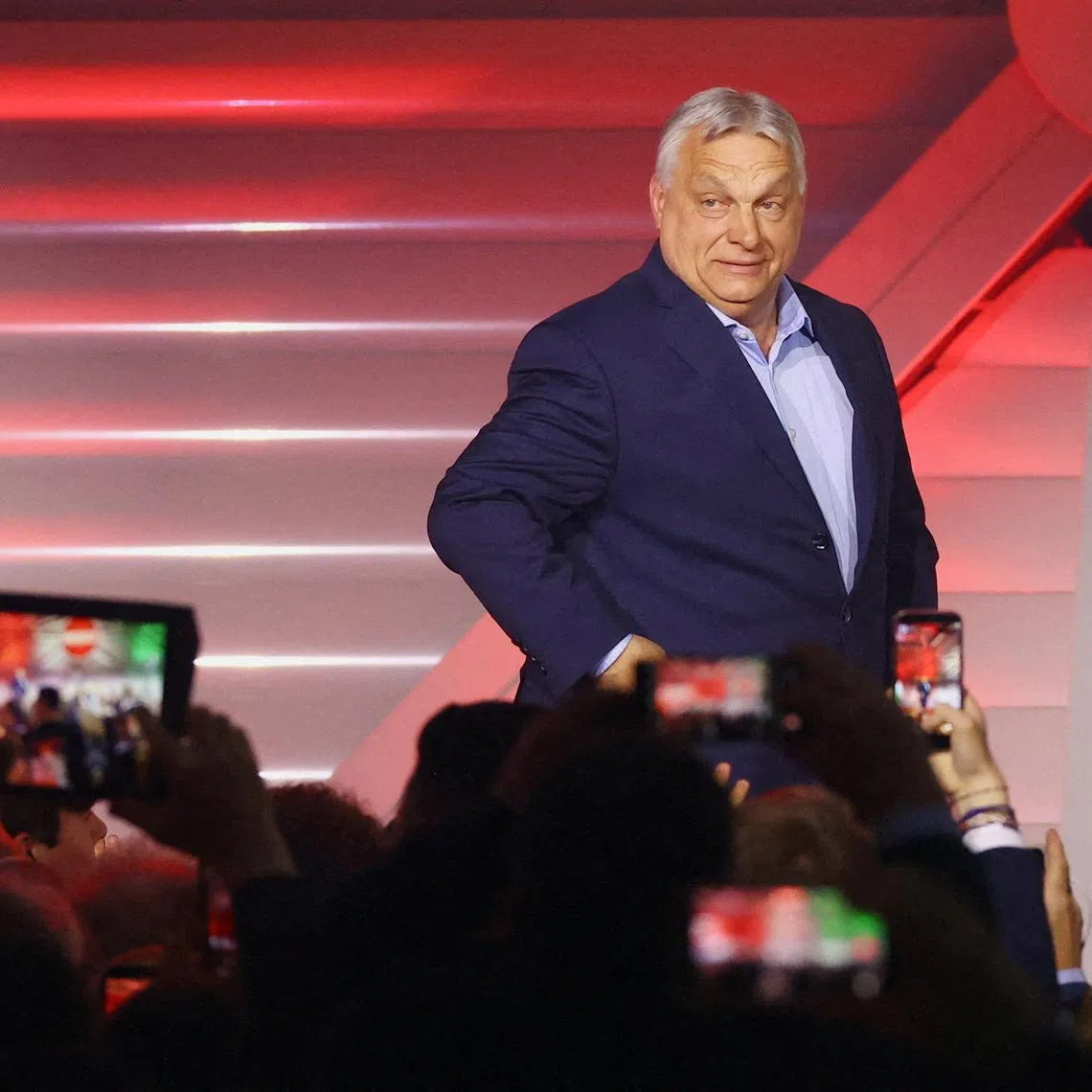 Hungarian Prime Minister Viktor Orban arrives to address supporters after the announcement of the partial results of parliamentary election in Budapest, Hungary, April 12, 2026. REUTERS/Bernadett Szabo