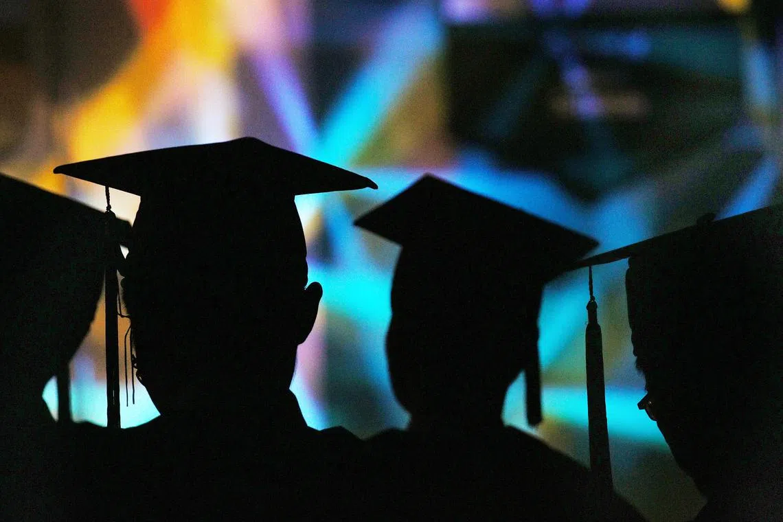 Silhouette image of the graduates at the Singapore Management University's (SMU) Commencement Ceremony held at its new School of Law Building, 11 July 2017.
