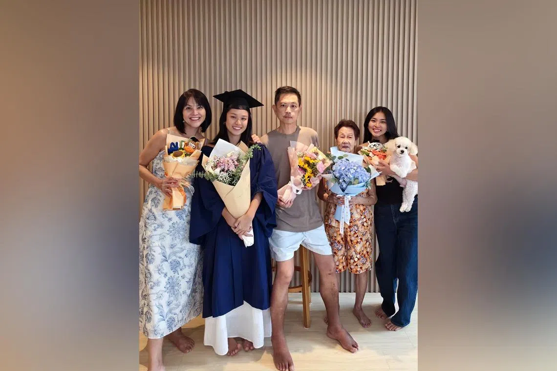 Actor Chew Chor Meng (third from left), in a family photo to celebrate his daughter, Chloe (second from left), graduating from NUS with a degree in Communications.
