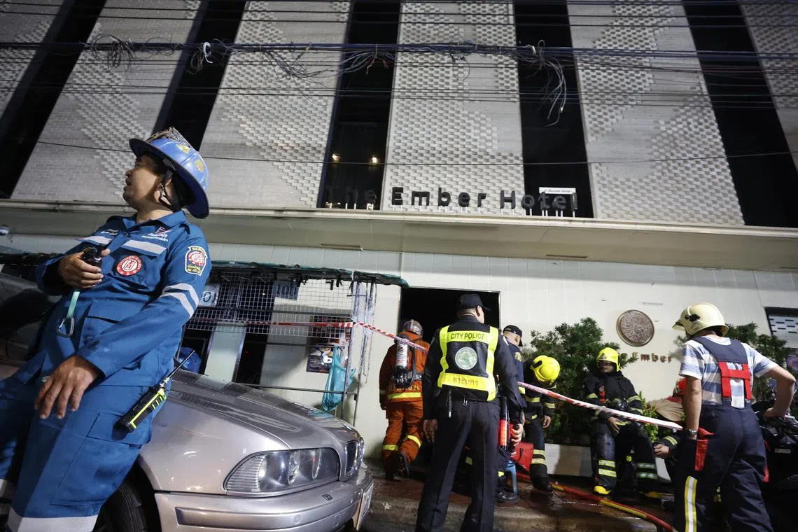 Police and firefighters at the scene of a blaze at The Ember Hotel in Bangkok, Thailand, on Dec 29, 2024.