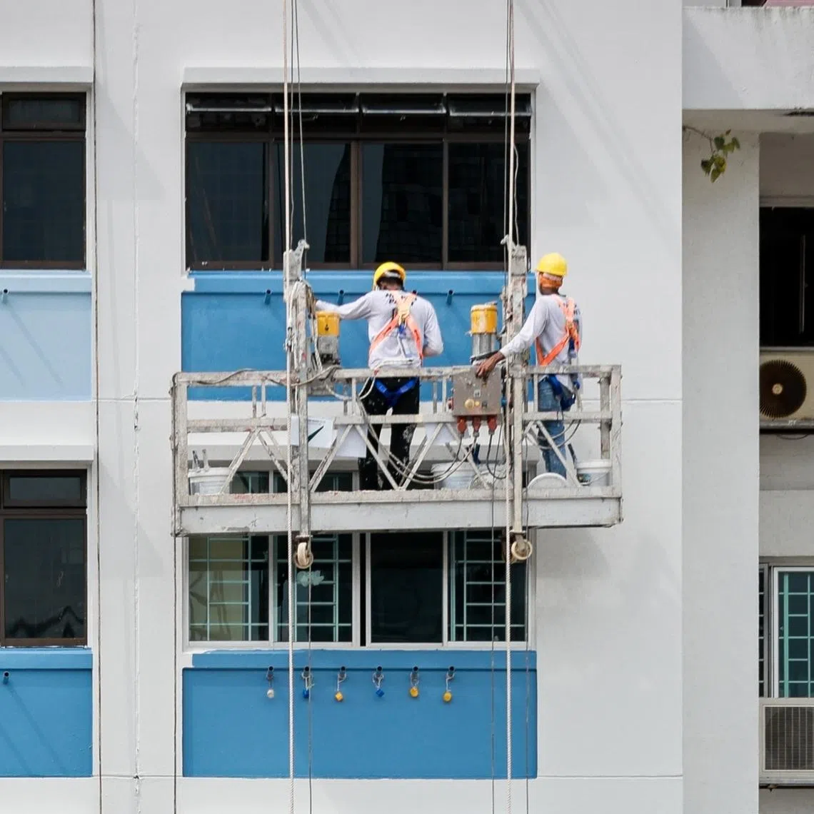 Today, there are more than 1.2 million work permit holders on the island.