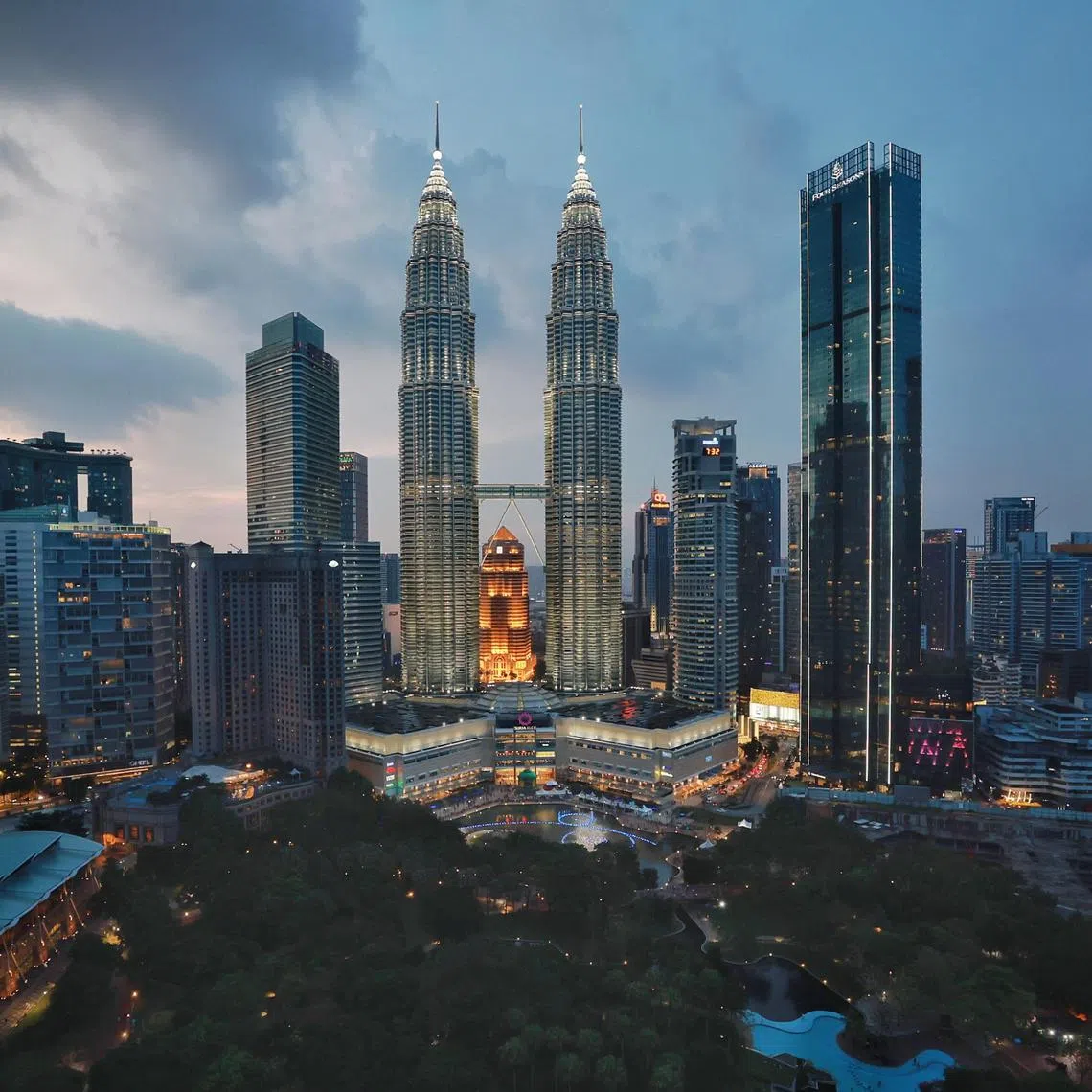 The Petronas Twin Towers as seen during dusk in Kuala Lumpur on March 19, 2023.
