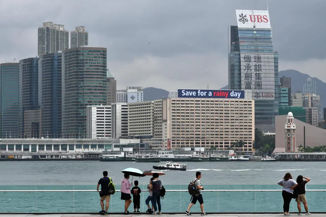 Billionaire clan is racing to overcome liquidity challenges connected to its real estate unit New World Development.