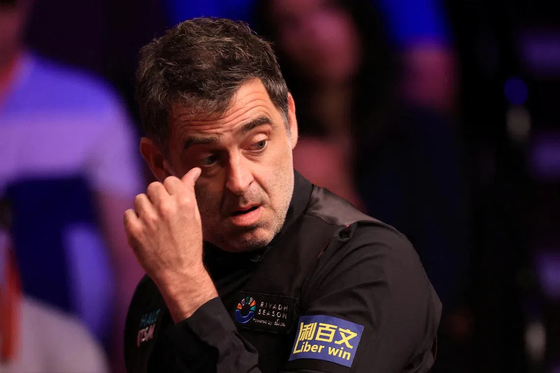 FILE PHOTO: Snooker - World Snooker Championship - The Crucible Theatre, Sheffield, Britain - May 2, 2025 England's Ronnie O'Sullivan reacts during his semi final match against China's Zhao Xintong Action Images via Reuters/Andrew Boyers/File Photo