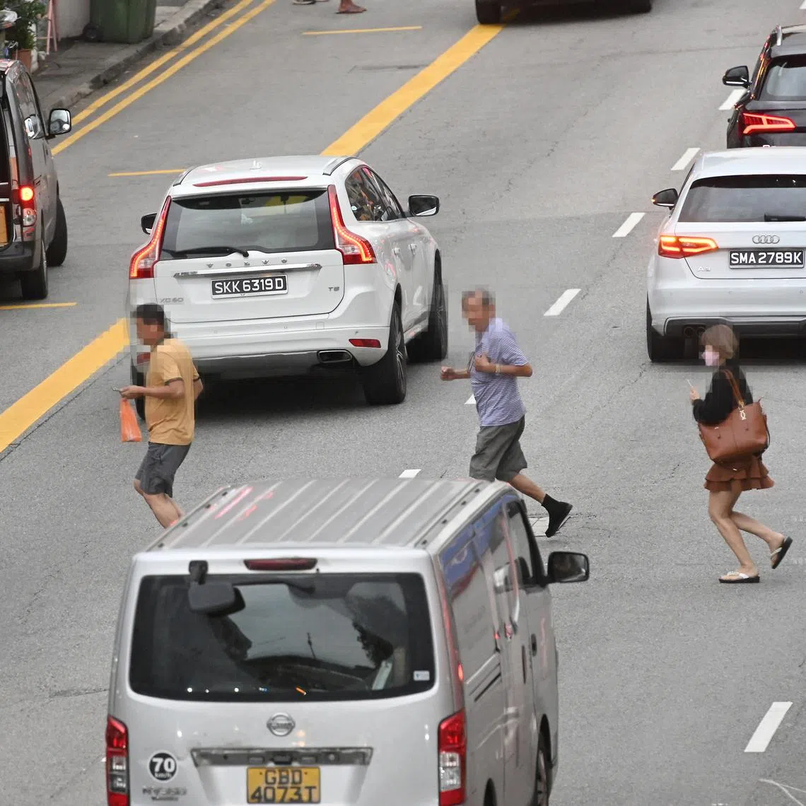 Jaywalkers along Geylang Road on Feb 13, 2023. Seniors jaywalking accounted for 73.9 per cent of fatal accidents.