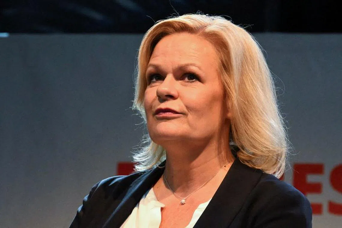 FILE PHOTO: German Interior Minister Nancy Faeser looks on as she delivers a statement during the federal Hesse state elections in Wiesbaden, Germany, October 8, 2023. REUTERS/Jana Rodenbusch