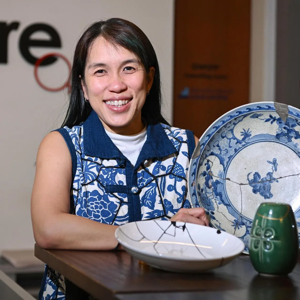 ST20260402_202616800725 Azmi Athni khshoon/ 

Ms Lim Shoon Yin, executive director of AWARE, with her kintsugi pottery, on April 2, 2026. 

ST PHOTO: AZMI ATHNI 


