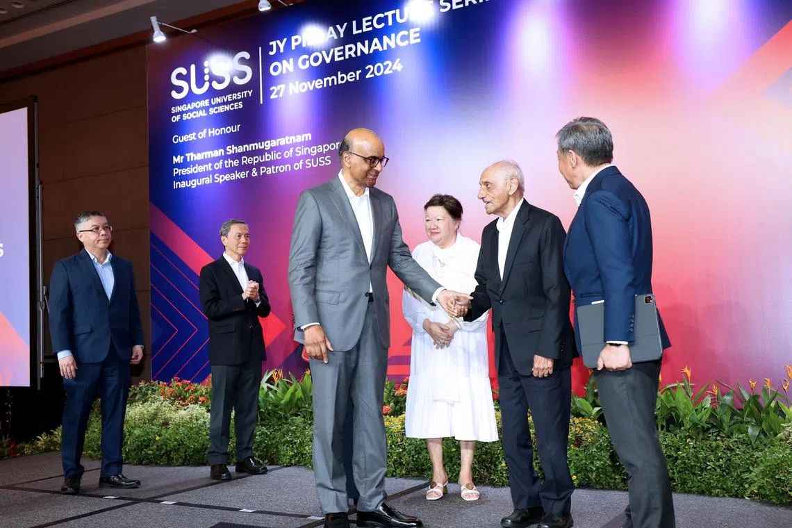 President Tharman Shanmugaratnam (left) shaking hands with Mr JY Pillay at the inaugural JY Pillay Lecture Series on Governance on Nov 27. 
