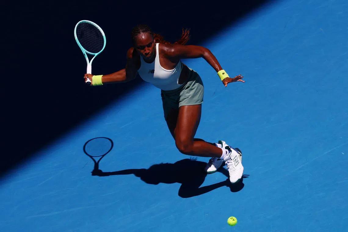 Tennis - Australian Open - Melbourne Park, Melbourne, Australia - January 13, 2025 Coco Gauff of the U.S. in action during her first round match against Sofia Kenin of the U.S. REUTERS/Edgar Su