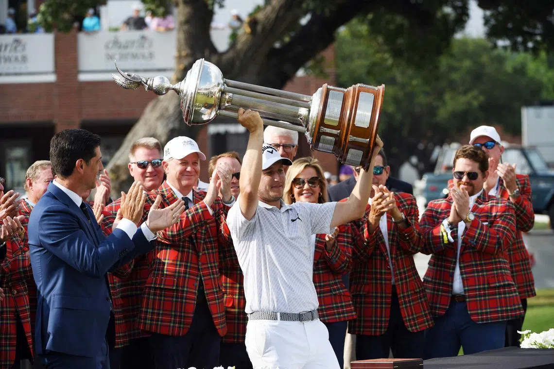 Emiliano Grillo of Argentina holding the trophy after winning the Charles Schwab Challenge in a play-off at Colonial Country Club on May 28 in Fort Worth, Texas.  