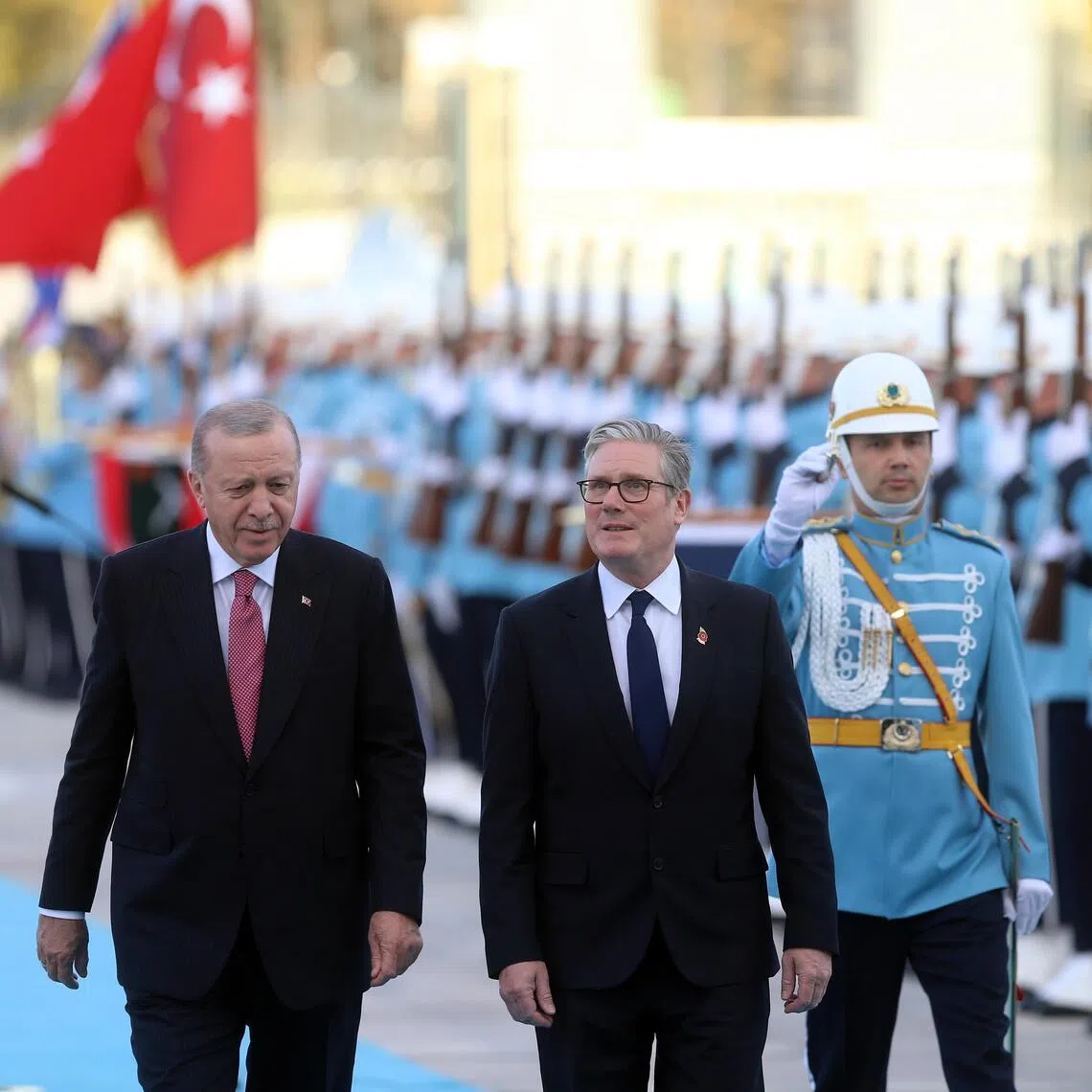 Turkish President Recep Tayyip Erdogan (left) welcoming British Prime Minister Keir Starmer (right) to Ankara, Turkey, on Oct 27.