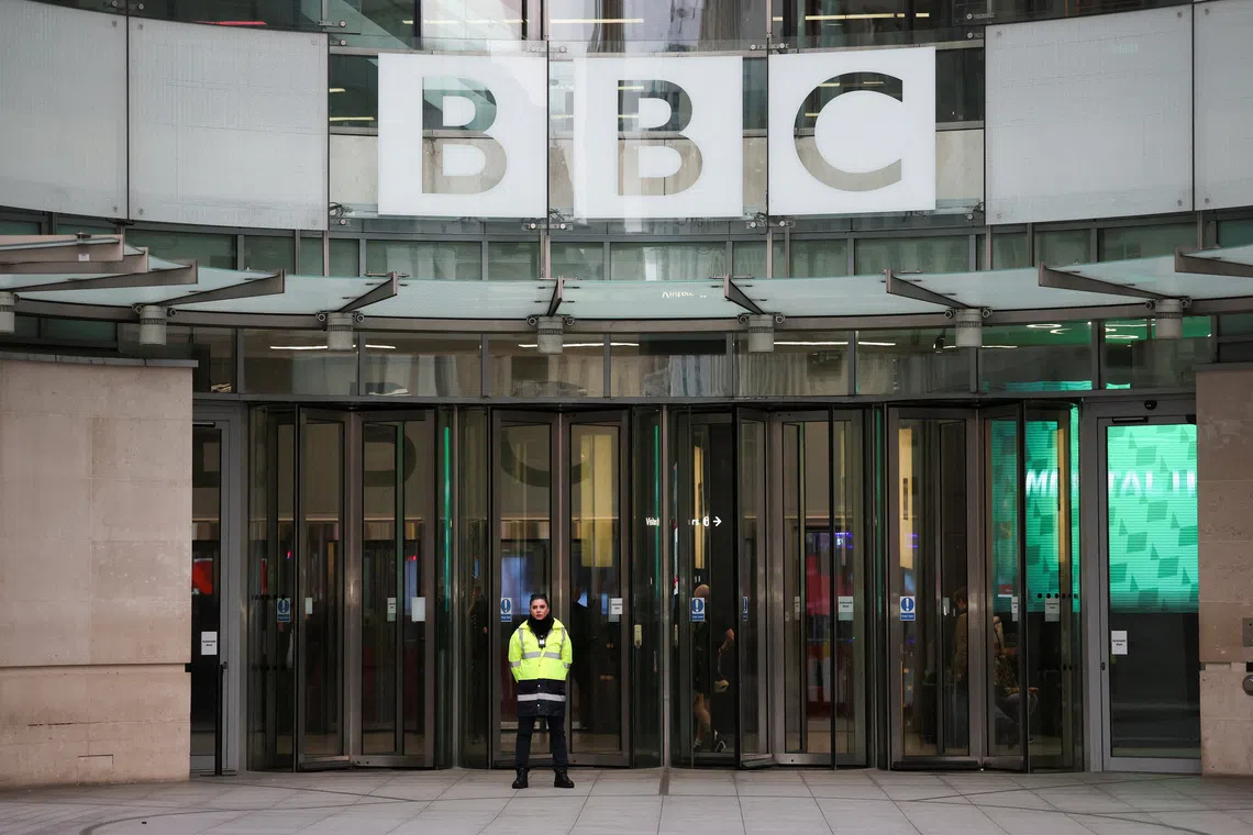 A security guard stands guard outside BBC Broadcasting House after Director General of BBC Tim Davie and Chief Executive of BBC News Deborah Turness resigned following accusations of bias at the British broadcaster, including in the way it edited a speech by U.S. President Donald Trump, in London, Britain, November 11, 2025. REUTERS/Hannah McKay