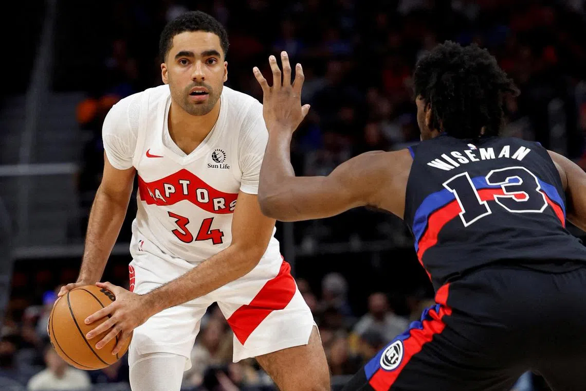 Toronto Raptors centre Jontay Porter (No. 34) in action against Detroit Pistons'James Wiseman during his time in the NBA.