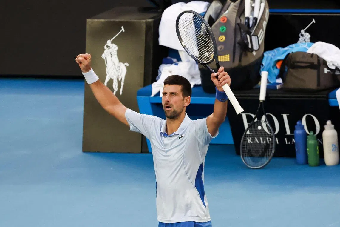 Novak Djokovic celebrates after victory against Taylor Fritz in the Australian Open quarter-finals.