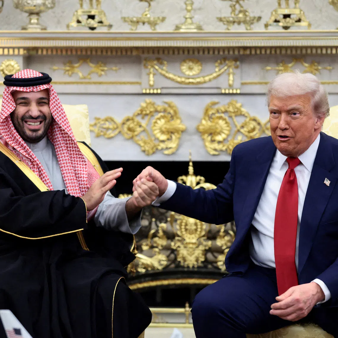 FILE PHOTO: U.S. President Donald Trump and Saudi Crown Prince and Prime Minister Mohammed bin Salman hold hands during a meeting in the Oval Office at the White House in Washington, D.C., U.S., November 18, 2025.  REUTERS/Evelyn Hockstein/File Photo