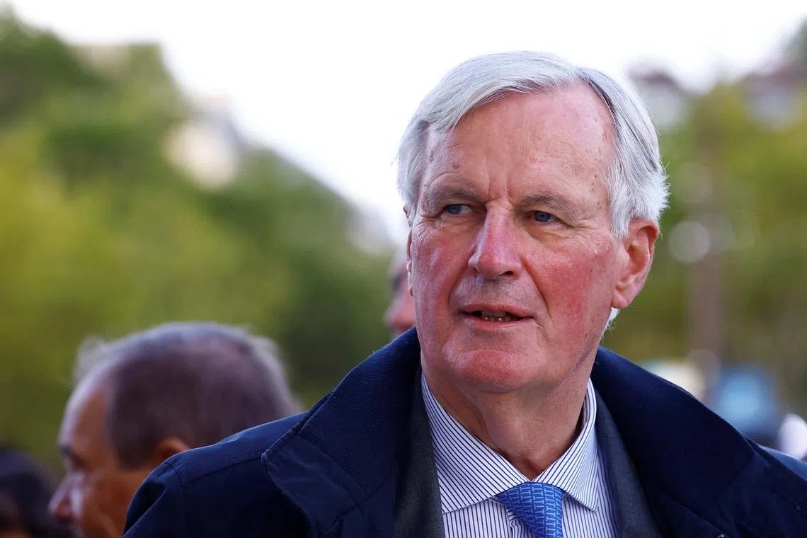 France's Prime minister Michel Barnier looks on during a parade of French athletes who participated in the 2024 Olympics and Paralympics in Paris, France September 14, 2024. REUTERS/Sarah Meyssonnier/Pool/File Photo
