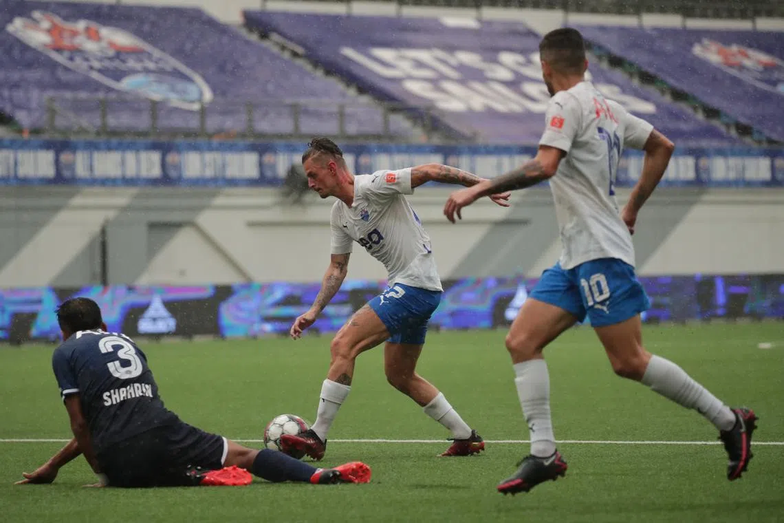 Sailors’ Maxime Lestienne (seen here dribbling past the Jaguars’ fallen Shahrin Saberin ), Diego Lopes (right) and Kim Shin-wook (not in picture) have each been fined $500. 