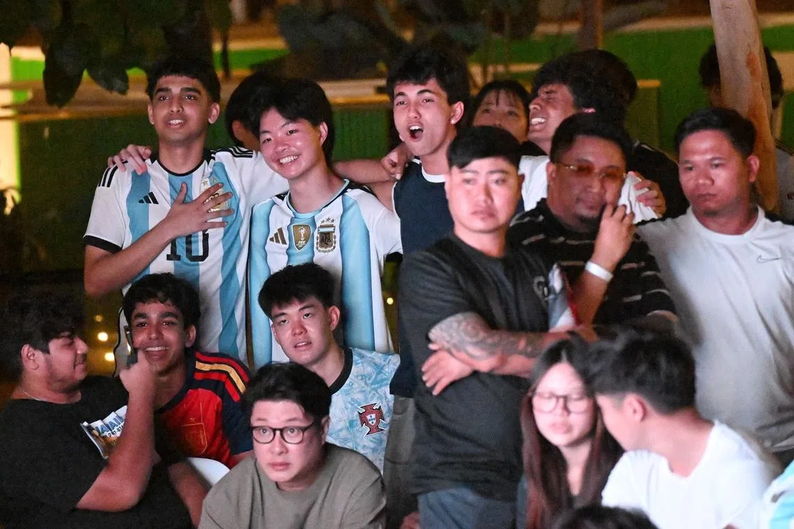 Argentinian fans cheering before the live screening of the FIFA World Cup 2026 final between Argentina and Spain at CHIJMES on July 20, 2026. ST PHOTO: AZMI ATHNI