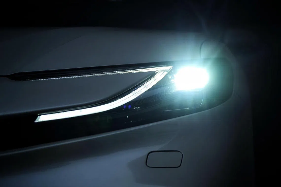 The headlight of the Toyota Camry, winner of The Straits Times Car of the Year award photographed on Dec 19, 2024.