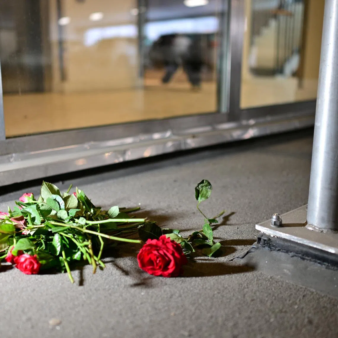 FILE PHOTO: Roses are  laid  at Selma Lagerlofs square in Gothenburg after the famous rapper C. Gambino was shot to death on Tuesday evening in a parking garage in Gothenburg, Sweden on june 05, 2024. TT News Agency/Bjorn Larsson Rosvall via REUTERS/File photo