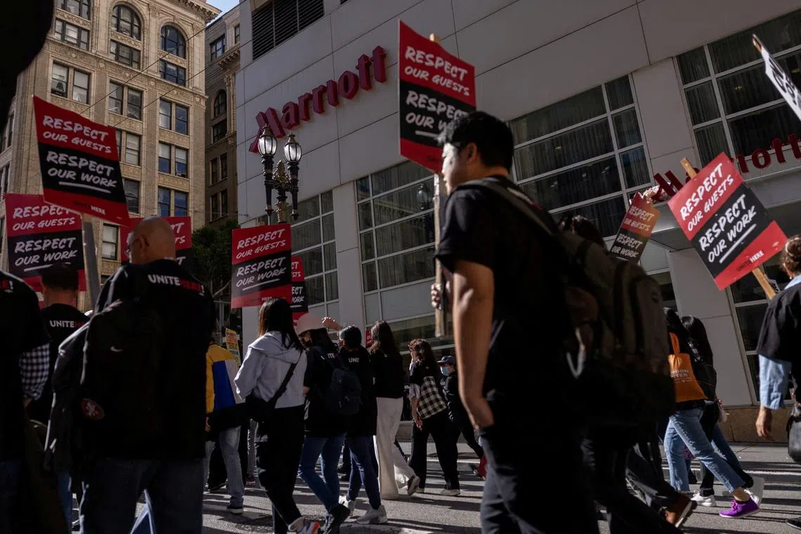 Unionised hotel workers attend a protest demanding significant pay raises, in San Francisco, in May 2024.