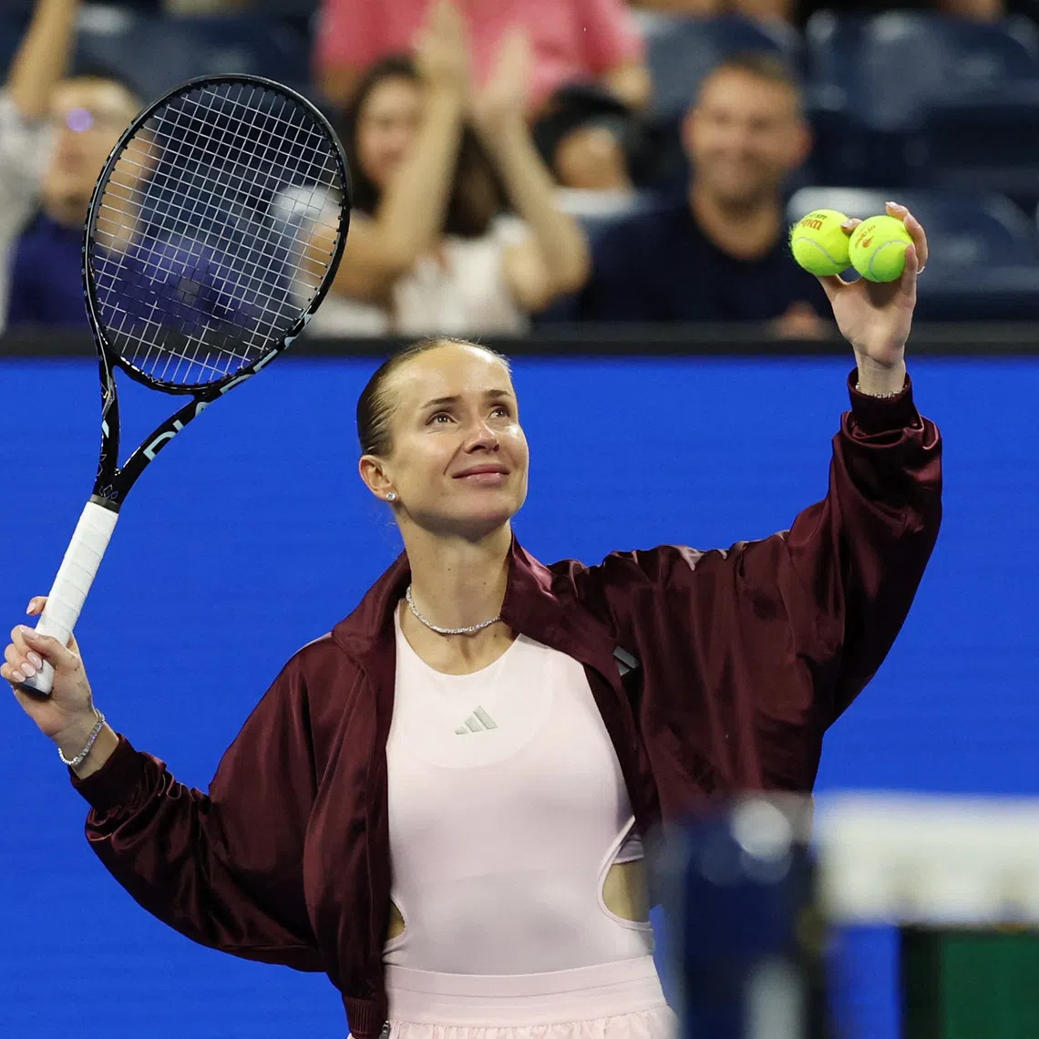 Tennis - U.S. Open - Flushing Meadows, New York, United States - August 30, 2026 Ukraine's Elina Svitolina throws balls to the crowd after winning her first round match against Argentina's Sola Sierra IMAGN IMAGES via REUTERS/Geoff Burke