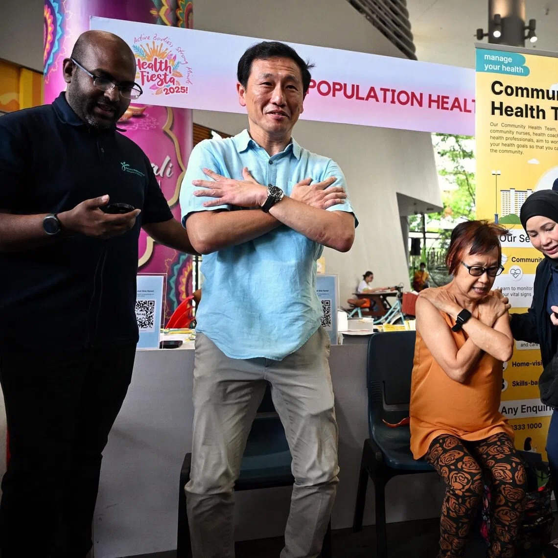 ST20251012_202534400902 Kua Chee Siong/ jthealth12/

Health Minister Ong Ye Kung participating in the chair rise test which tests the muscle strength of the elderly. 

Sembawang GRC holding its annual health fiesta themed Active Bodies, Strong Minds, at Kampung Admiralty, on Oct 12, 2025. 
Organised by the Sembawang West MAEC, the fiesta aims to enhance mental resilience through a variety of fitness try-out activities and informative wellness talks.