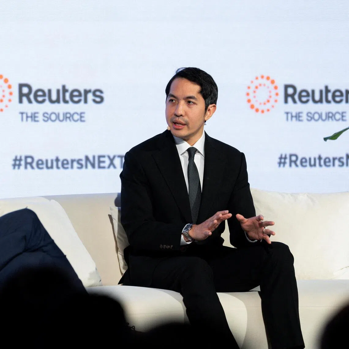 Thailand’s Vice-Minister of Finance Santitarn Sathirathai (right) speaks during an interview at the Reuters NEXT conference in Singapore on July 9.