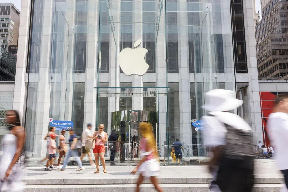 Apple's sales rose 5 per cent in the third quarter, topping estimates as iPad and Services revenues jumped.