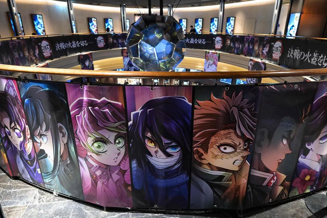 This photo taken on Sept 9, 2025 shows signage and displays to promote the Japanese anime film Demon Slayer, at a cinema in the Ikebukuro area of Tokyo. 