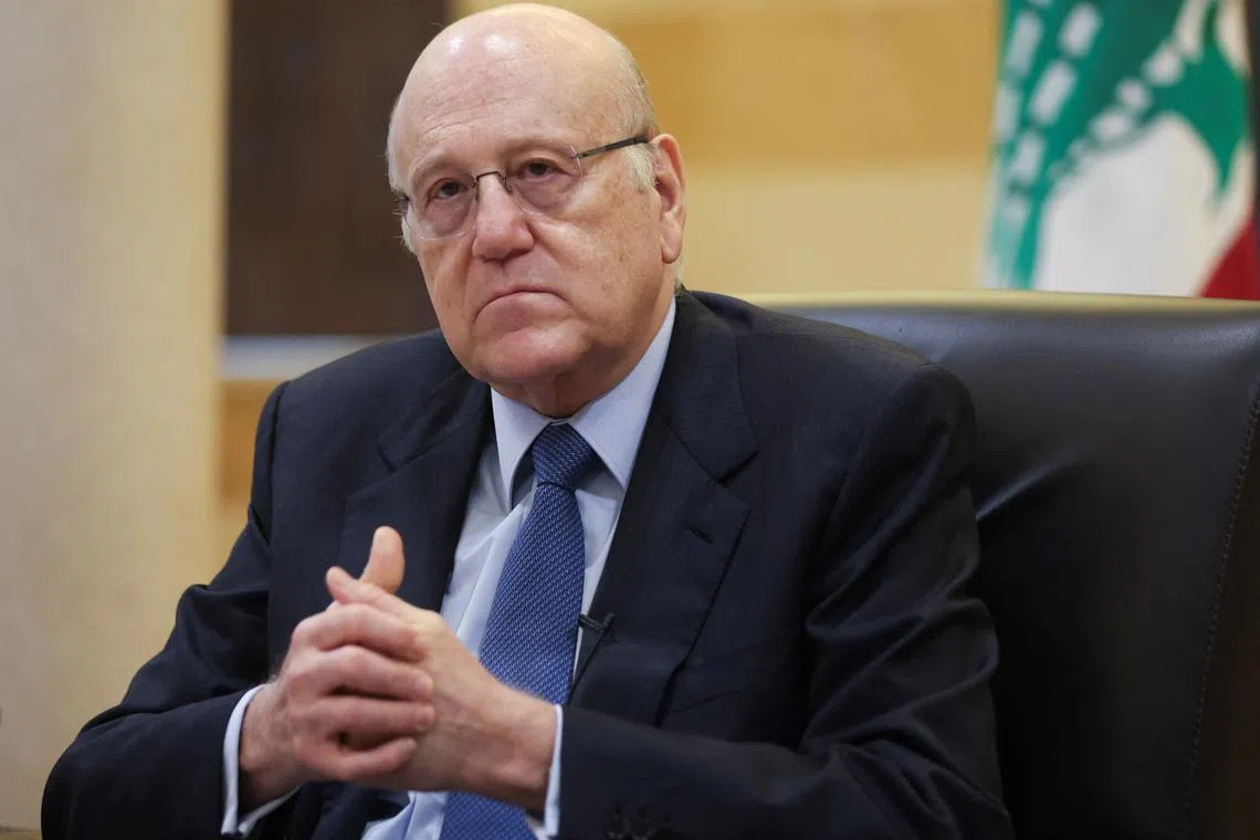 FILE PHOTO: Lebanon's caretaker prime minister Najib Mikati attends an interview with Reuters at the government headquarters in downtown Beirut, Lebanon February 29, 2024. REUTERS/Mohamed Azakir/File Photo