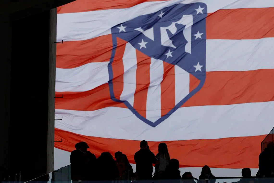 Soccer Football - LaLiga - Atletico Madrid v Real Betis - Metropolitano, Madrid, Spain - March 3, 2024 Atletico Madrid fans display a flag in the stands before the match. REUTERS/Juan Medina