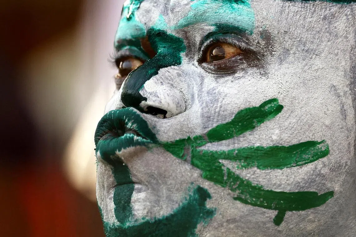 A Nigeria fan is pictured inside the stadium before the match during the Africa Cup of Nations, semi-final match between Nigeria and South Africa held at the Stade de la Paix, Bouake, Ivory Coast on Feb 7, 2024.  