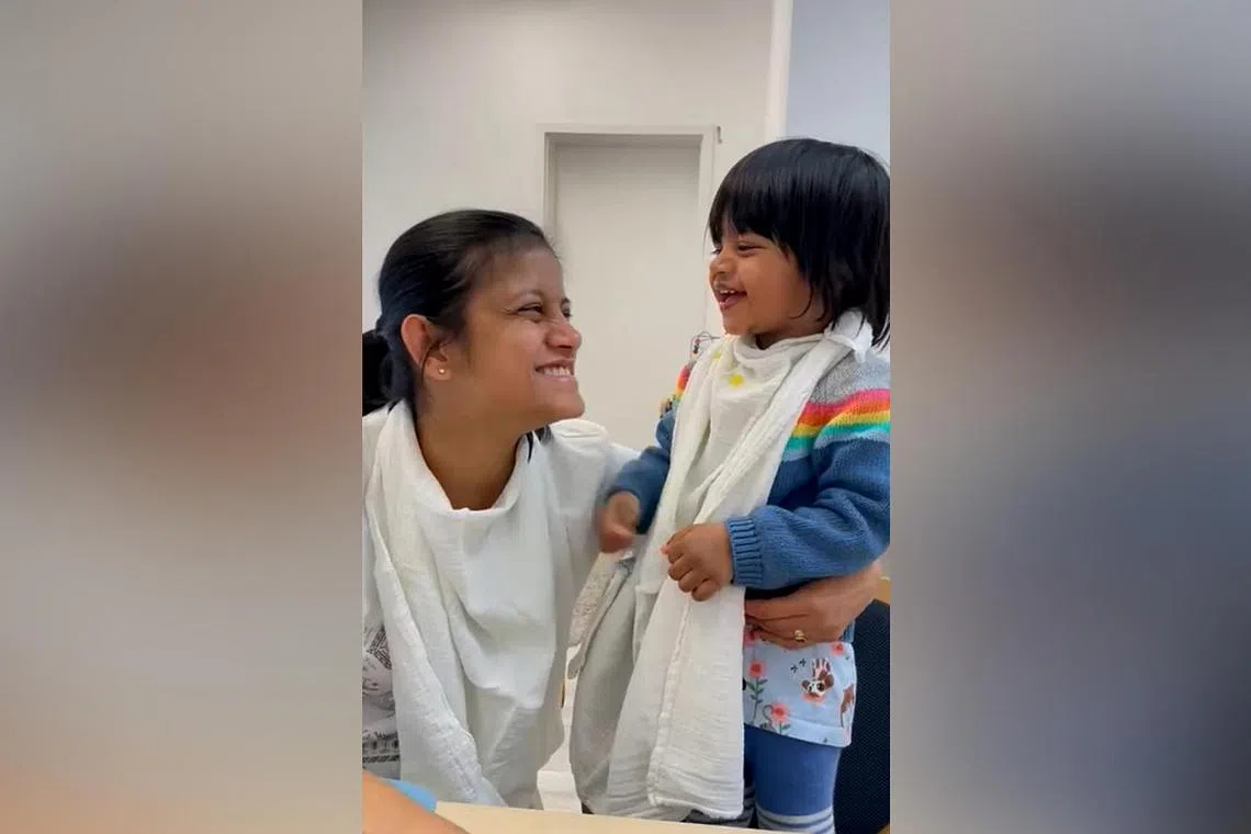 Ms Dhara Shah (left) with her daughter Ariha Shah during one of the visiting sessions.