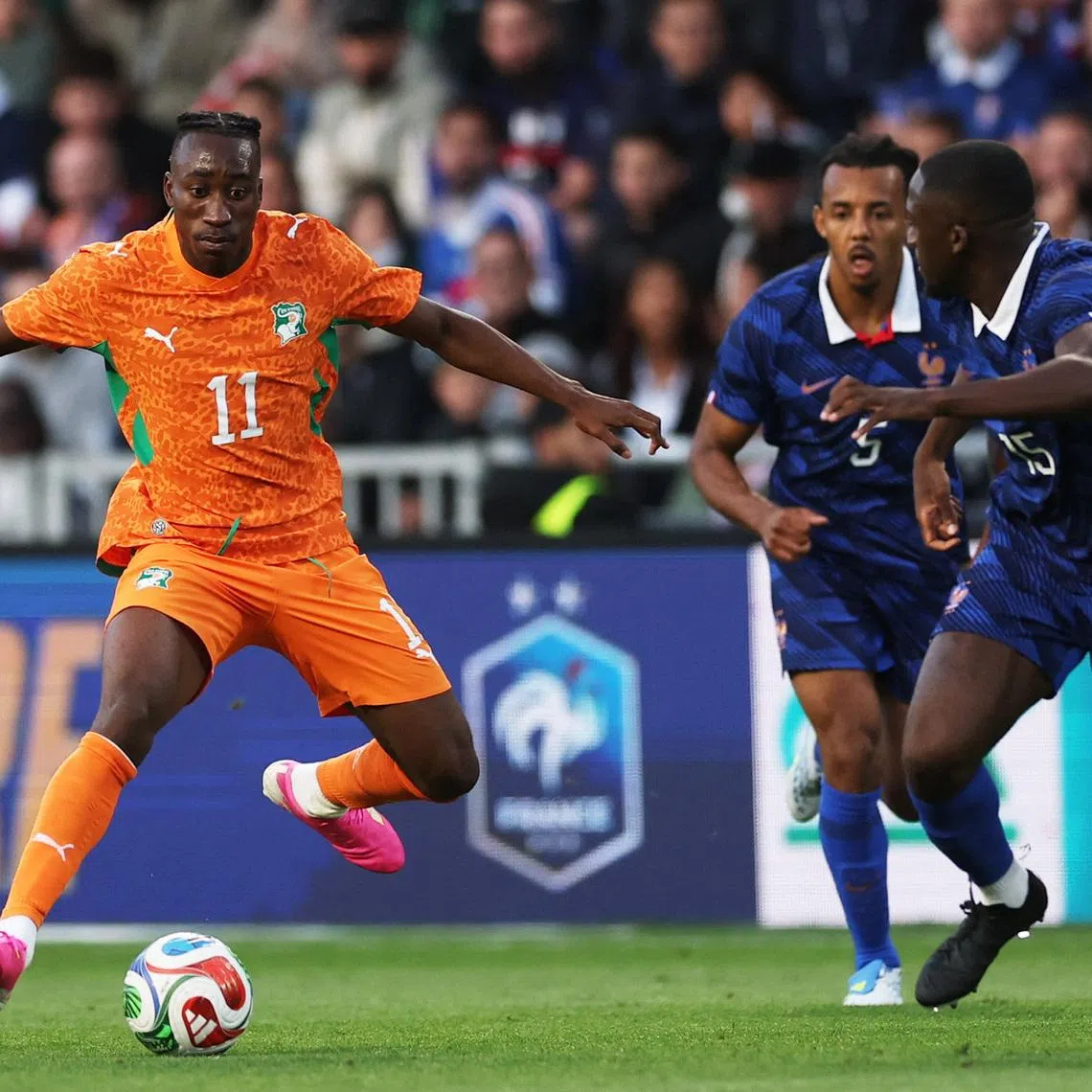 Soccer Football - International Friendly - France v Ivory Coast - The Stade de la Beaujoire - Louis Fonteneau, Nantes, France - June 4, 2026 Ivory Coast's Yan Diomande in action with France's Ibrahima Konate REUTERS/Gonzalo Fuentes