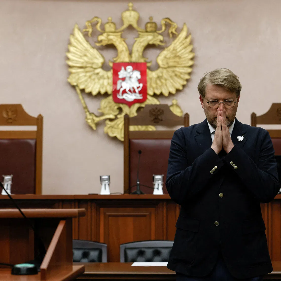 Chairman of Russia's Yabloko political party Nikolai Rybakov reacts after a hearing of the Supreme Court, which barred the party from contesting September's parliamentary elections over allegations of undeclared funding and breaches of campaigning rules, in Moscow, Russia, August 10, 2026. REUTERS/Yulia Morozova