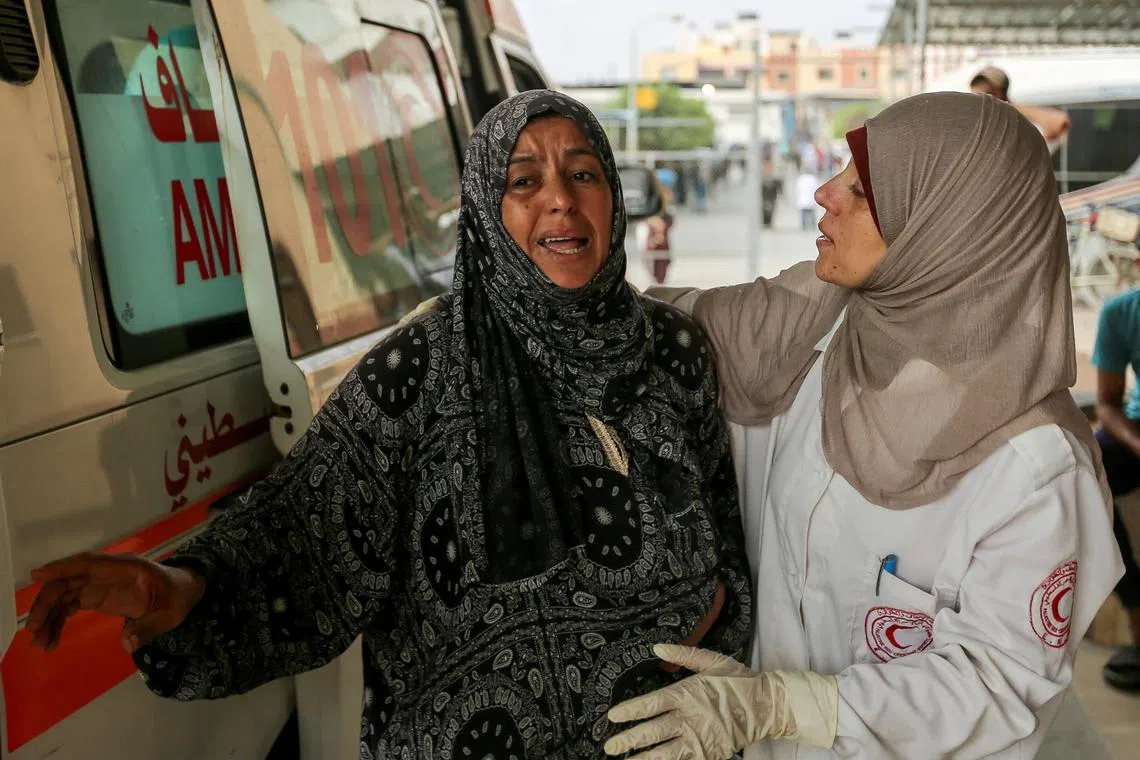 A relative of a Palestinian killed in an Israeli strike reacts at Nasser hospital, amid Israel-Hamas conflict, in Khan Younis in the southern Gaza Strip July 22, 2024. REUTERS/Hatem Khaled