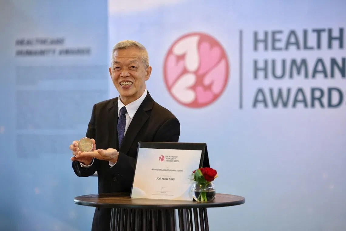 Mr Joo Yeow Sing with his individual award for compassion during the Healthcare Humanity Awards at Clifford Pier, on Nov 6.