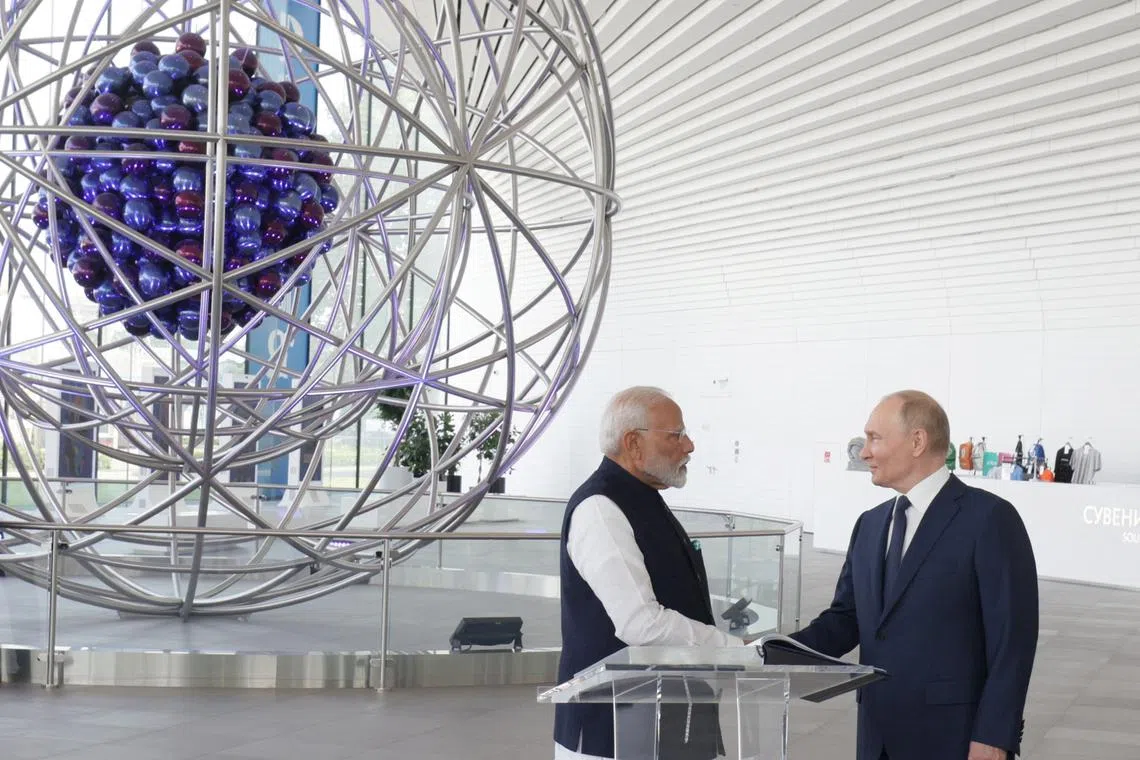 Russia's President Vladimir Putin and India's Prime Minister Narendra Modi visit the Atom pavilion at the Exhibition of Achievements of National Economy (VDNKh) in Moscow, Russia July 9, 2024. Sputnik/Gavriil Grigorov/Pool via REUTERS